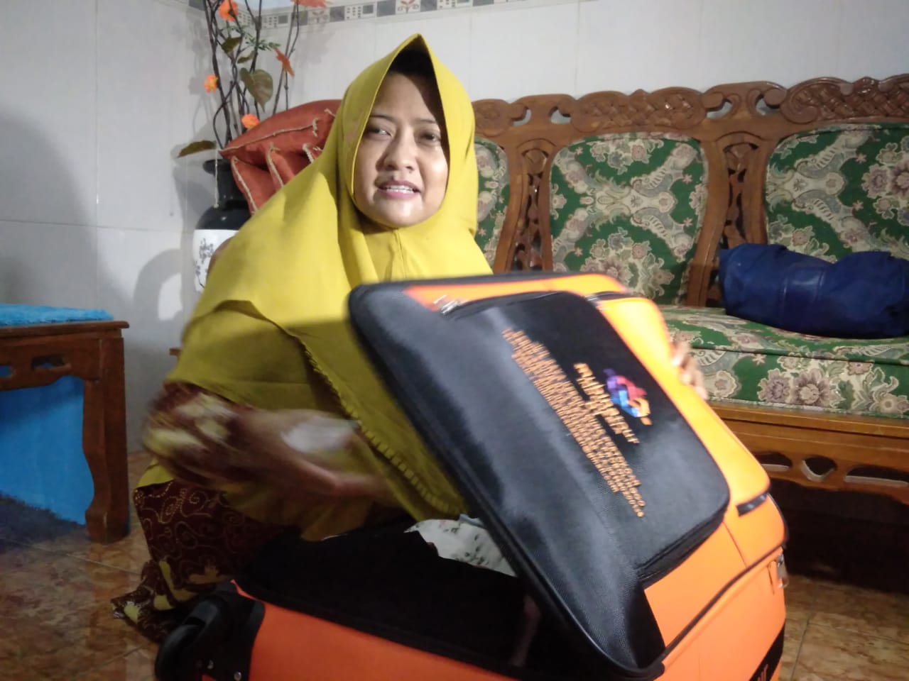 Nurul Qomariyah, Pamekasan, Umroh, Saudi, Corona